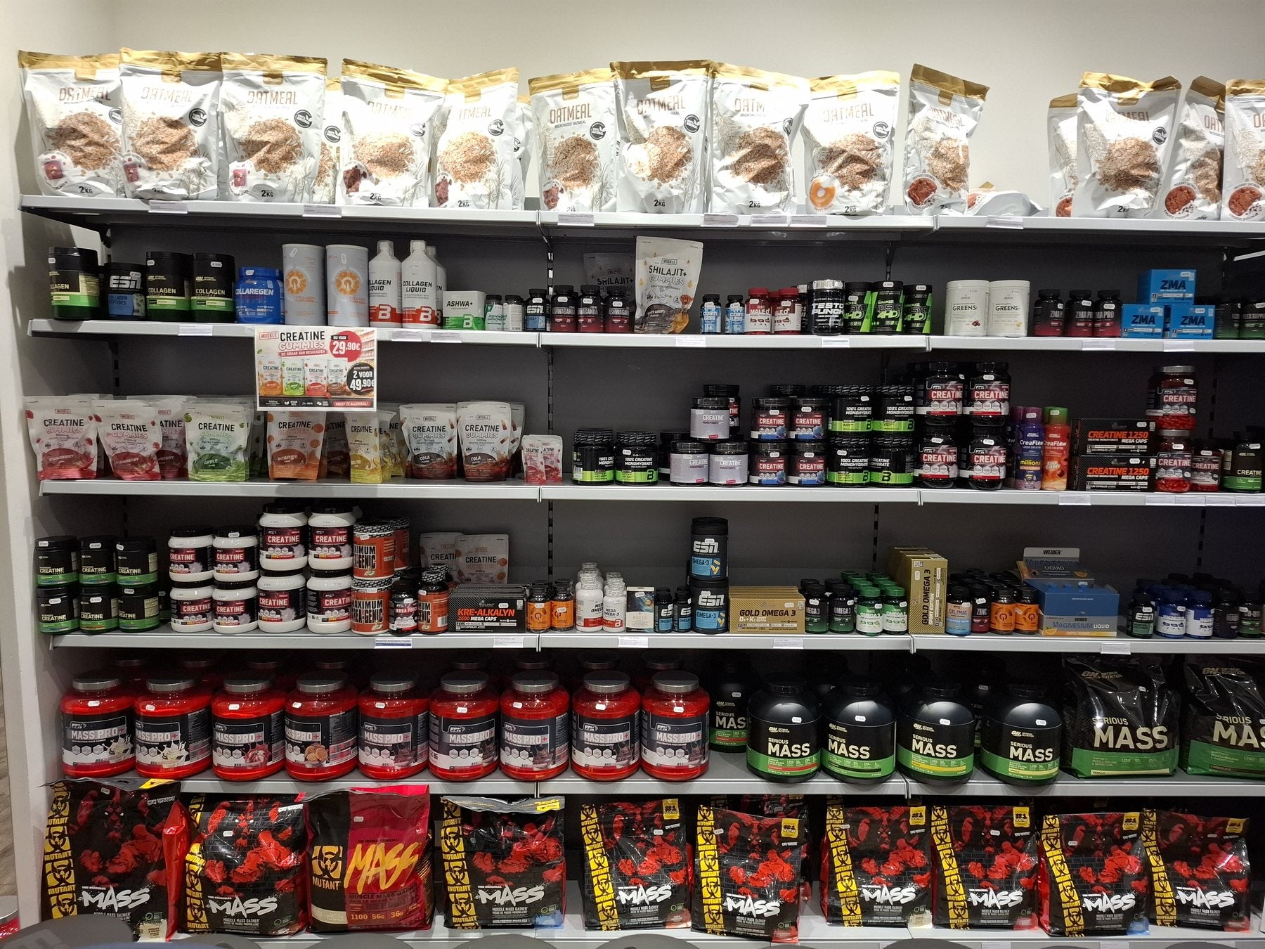 Wand met oatmeal, creatine en mass gainers in MUSKLE Antwerpen